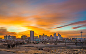 Denver Metro skyline with an orange sunset